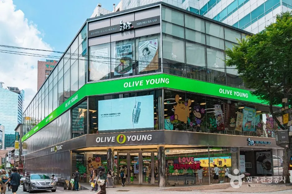 An Olive Young cosmetics shop on a corner in Myeongdong, Seoul